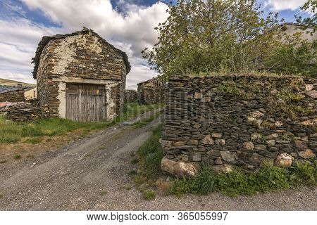 Traditional Slate Buildings In El Muyo Black Village Of The Riaza District In The Province Of Segovi