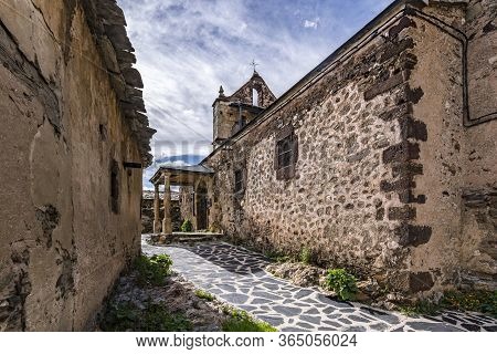 Streets And Church Of El Muyo (church Of Santos Martires San Cornelio And San Cipriano). Village Of