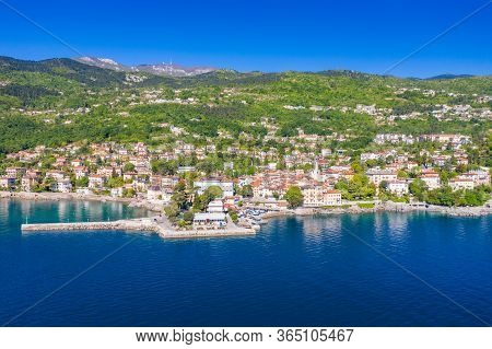 Croatia, Adriatic Coast, Beautiful Old Town Of Lovran, Historic Center And Coastline Aerial View, Kv