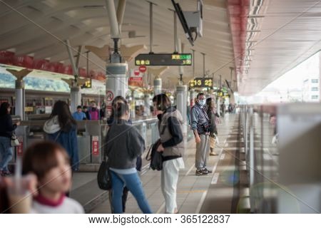 Taipei, Taiwan - January 07: Man Wears A Face Mask While Waiting For The Taipei Metro On The Platfor