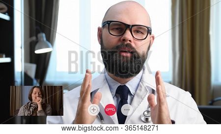 Telemedicine. Consultation with physician through mobile video call. Woman calling from home and talking to a doctor online. Screen interface, picture-in-picture (PiP)