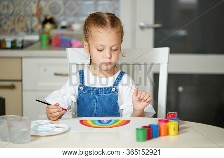 Thank To Nhs. Kid Painting The Rainbow During Covid-19 Quarantine At Home. Coronavirus Covid-19 Outb