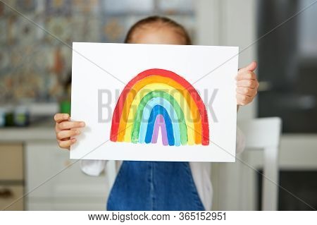 Thank To Nhs. Kid Painting The Rainbow During Covid-19 Quarantine At Home. Coronavirus Covid-19 Outb