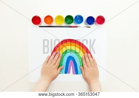 Thank To Nhs. Kid Painting The Rainbow During Covid-19 Quarantine At Home. Covid-19 Outbreak. Childr