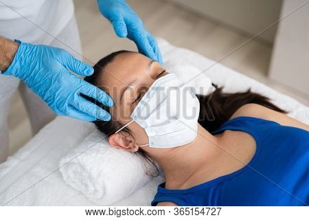 Reflexology Head Spa Massage For Woman In Face Mask