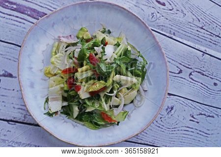 Healthy Vegan Lunch Bowl.avocado, Roket Leaves, Romain Lettuce, Tomato, Cucumber And Onion Vegetable
