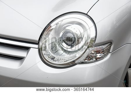 Novosibirsk/ Russia - May 02 2020: Toyota Sienta,  Modern Silver Car Xenon Lamp Headlight. Detail Li
