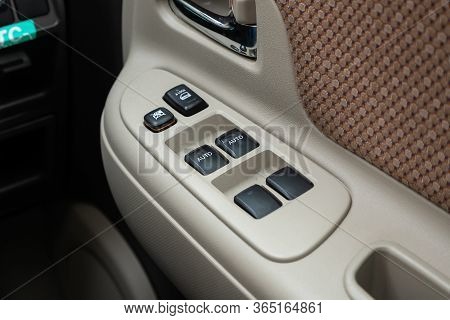 Novosibirsk/ Russia - May 02 2020: Toyota Sienta, Interior Of Modern Car. Side Door Buttons: Window,