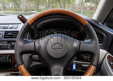 Novosibirsk/ Russia - May 02 2020: Nissan Presage, Salon Of A New Stylish Car. Steering Wheel With R