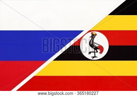 Russia Or Russian Federation Vs Republic Of Uganda, Symbol Of Two National Flags From Textile. Relat