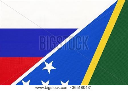 Russia Or Russian Federation Vs Solomon Islands, Symbol Of Two National Flags From Textile. Relation