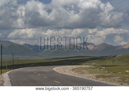 A Road Passing Through The Grasslands Of Qilian Mountains