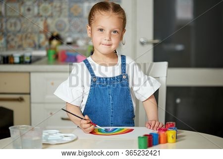 Thank To Nhs. Kid Painting The Rainbow During Covid-19 Quarantine At Home. Coronavirus Covid-19 Outb