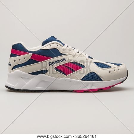 Vienna, Austria - June 14, 2018: Reebok Aztrek Beige, Navy Blue, Pink And White Sneaker On White Bac