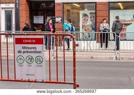 Montreal, Ca - 8 May 2020:  Covid-19 Safety Guideline French Sign On Masson Street