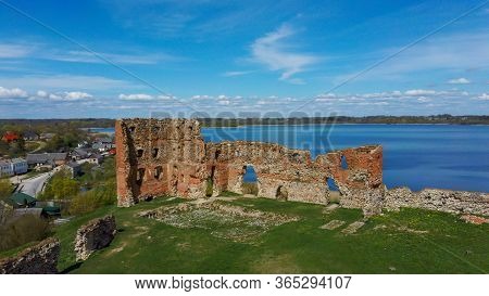Aerial View Of The Ludza Medieval Castle Ruins On A Hill Between Big Ludza Lake And Small Ludza Lake