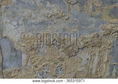 Background Of A Weathered Wall Where The Plaster Falls Off