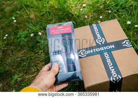Paris, France - Apr 24, 2020: Man Hand Pov With Single Parcel Logotype Of Contorion Shop, The Online