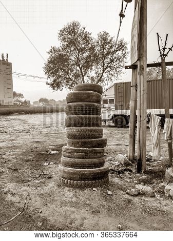 Stacked Tyre At Road Side Tyre Change Or Service Shop