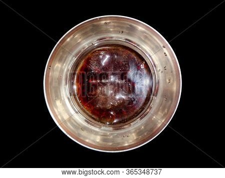 Top Angle View Of Scotch Whiskey In The Glass Isolated On Black Background