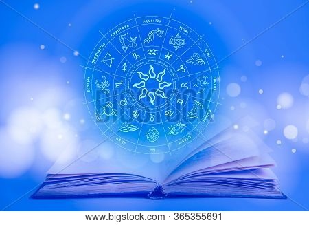Open Book And Illustration Of Zodiac Wheel With Astrological Signs On Blue Background