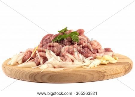 Chopped Pork With Chopped Onions And Garlic, Garnished With Parsley. Chopped Pork On A Cutting Board