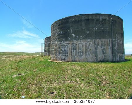 Very Old Concrete Water Reservoirs In The Countryside Near Maqabaqabeni In The Winterton Area Of Sou