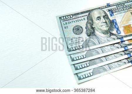 Money American Hundred Dollar Bills. Pile Of Various Currencies Isolated On White Background. Assort