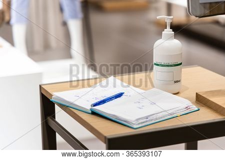 New Normal Of Hand Sanitizing And Recording Visitors Details For Traceability As Requirement Before 