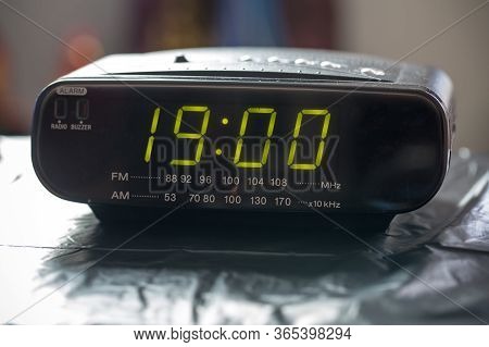 Black Digital Alarm Radio Clock.alarm Radio Clock Indicating Time To Wake Up. Digital Clock Closeup 