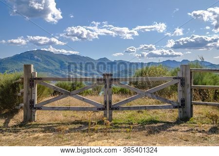 Open Gate In A Field In Argentina, Tranquera To Prevent The Movement Of Farm Animals