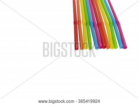 Seven Straws Of Bright Rainbow Colors Isolated On A White Background. They Lie In A Row. Greeting Ca