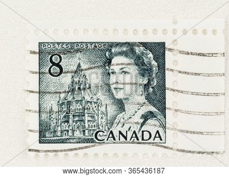 Seattle Washington - May 8, 2020: Engraved 1971 Queen Elizabeth Definitive Stamp Featuring Library O
