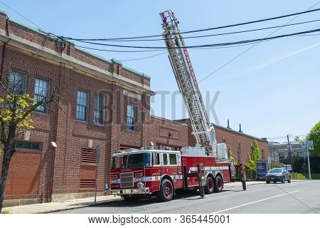 Chelsea, Ma, Usa - May 9, 2019: Chelsea Fire Truck Ladder 3 Raised The Ladder In Downtown Chelsea, M