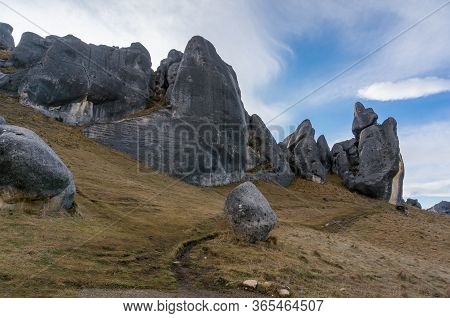 Huge Limestone Boulders, Megalith Rock Formations In Kura Tawhiti Conservation Area In New Zealand