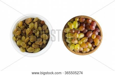 Grapes And Raisins Kishmish Isolated On White Background. Top View. Grapes And Dried Fruit In A Wood