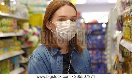 Woman Buyer Wearing A Protective Mask.shopping During The Pandemic.emergency To Buy List.panic Buyin