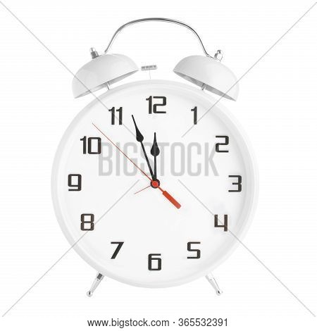 White Old-fashioned Alarm Clock Showing 5 Five Minutes To 12 Twelve Oclock Isolated On White Backgro