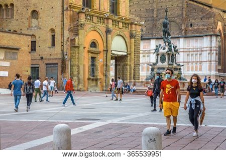Bologna, Italy - May 9, 2020: Phase 2 Coronavirus. Couples And Families With Surgical Mask In Piazza