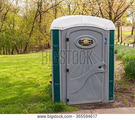 Pittsburgh, Pennsylvania, Usa 5/10/20 A Pittsburgh Potty Portable Toilet Placed In Schenley Park For