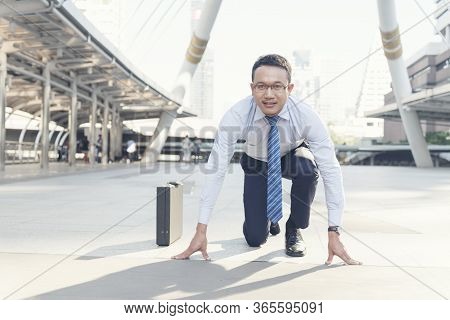 Businessman Standing In Start Position. Business Start Up Ready For New Career Before Race Faster. B