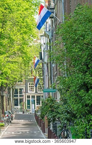 Medieval facades at the Prinsengracht in Amsterdam Netherlands at Kingsday