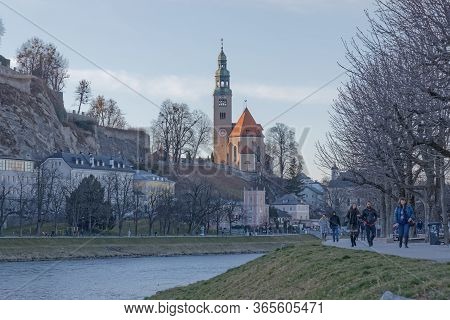 Salzburg, Austria, February 22, 2020: Panoramic View Of Mulln Church On Winter Day In Salzburg Austr