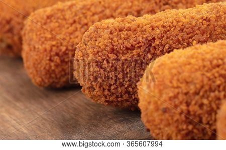 Brown Crusty Dutch Kroketten On A Serving Tray, Isolated On A White Background