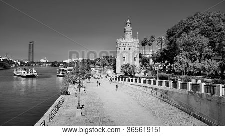 Seville, Spain - 10 February 2020 : View Of Golden Tower Torre Del Oro In Beautiful Seville Spain Ci