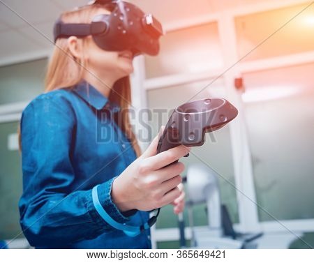 Eye Treatment. Patient In Virtual Reality Goggles. Checking The Girls Vision
