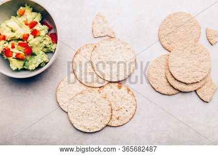 Healthy Gluten Free Snacks. Oatcakes And Sea Salt Crackers With Avocado Mash