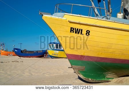 Rewal, Poland - September 02, 2019: Fishing Boats On The Beach Of The Polish Baltic Sea Coast Near R