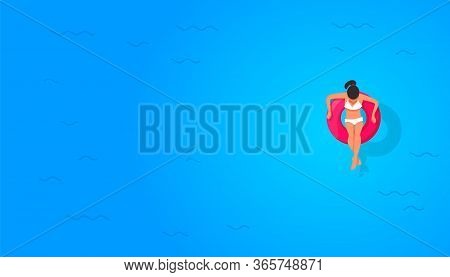 Girl In A Swimming Circle At Sea With Copyspace On Blue Background, Top View, Flat Lay. Minimal Comp