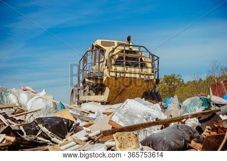 Compactor At A Landfill Processing Municipal Waste